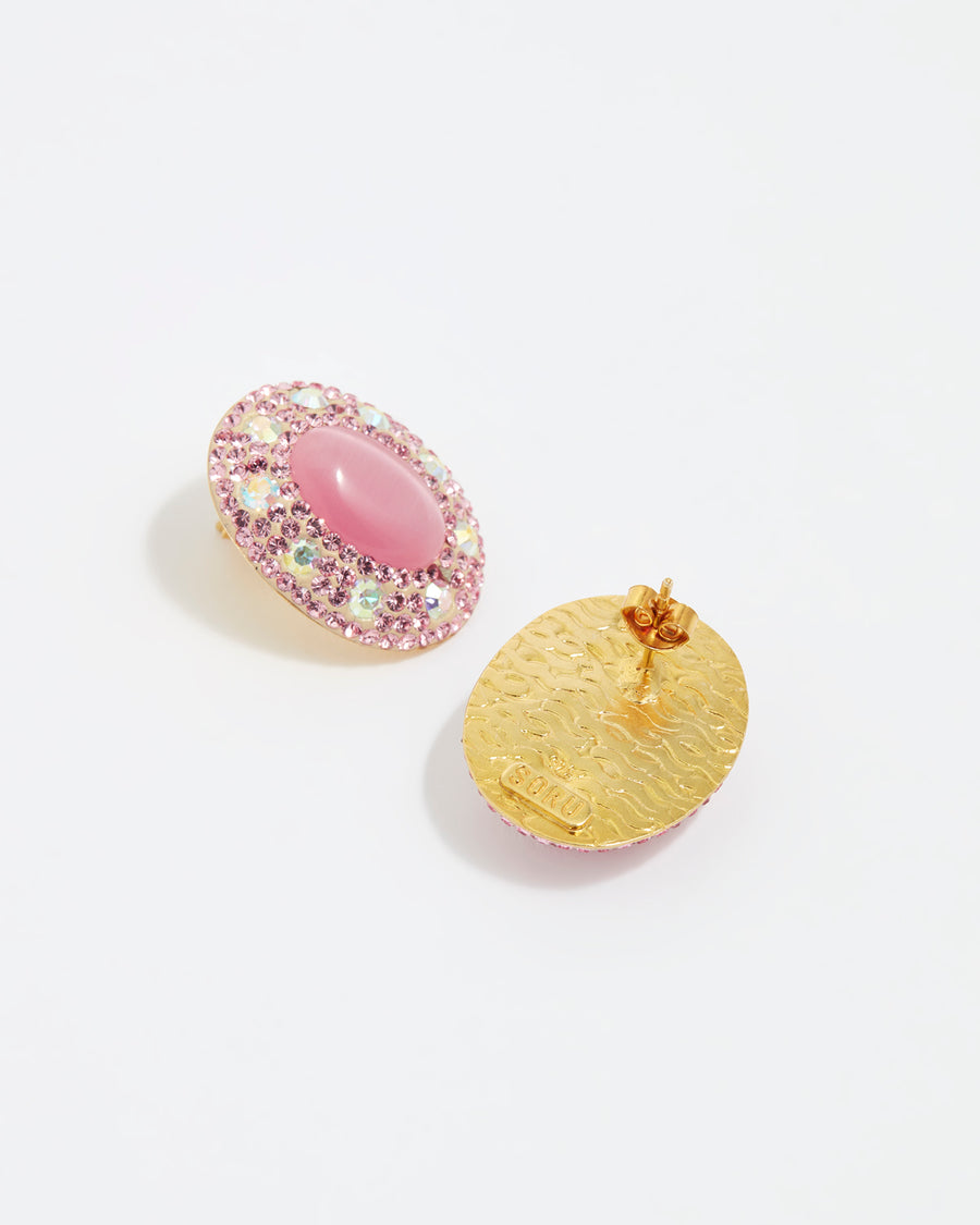 Reverse and front Product shot of Soru Jewellery large pink stud earrings surrounded by crystals on a white background