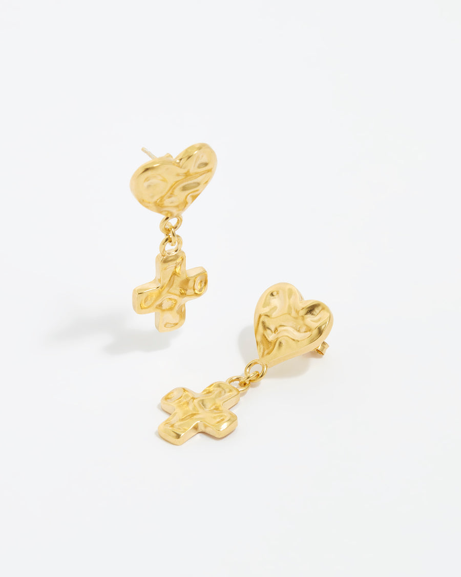 soru jewellery product shot of textured heart and cross earrings on a white background