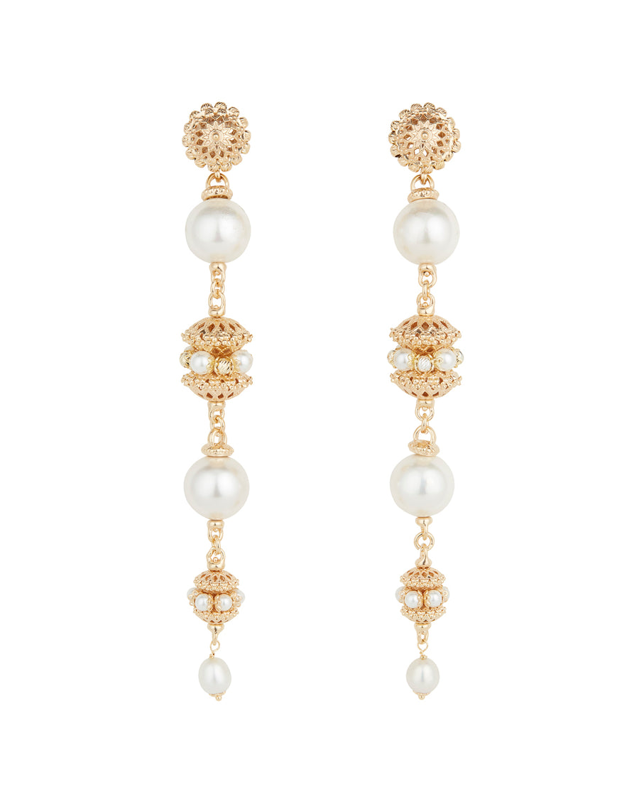 Product shot of statement gold linear earrings with pearl detailing on white background.