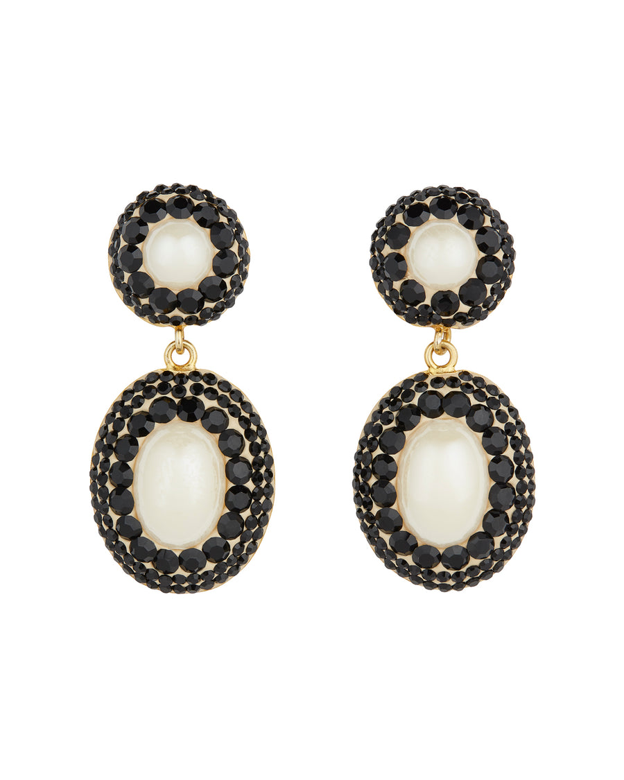 Product shot of statement drop pearl earrings, featuring black crystal detailing, on a white background.