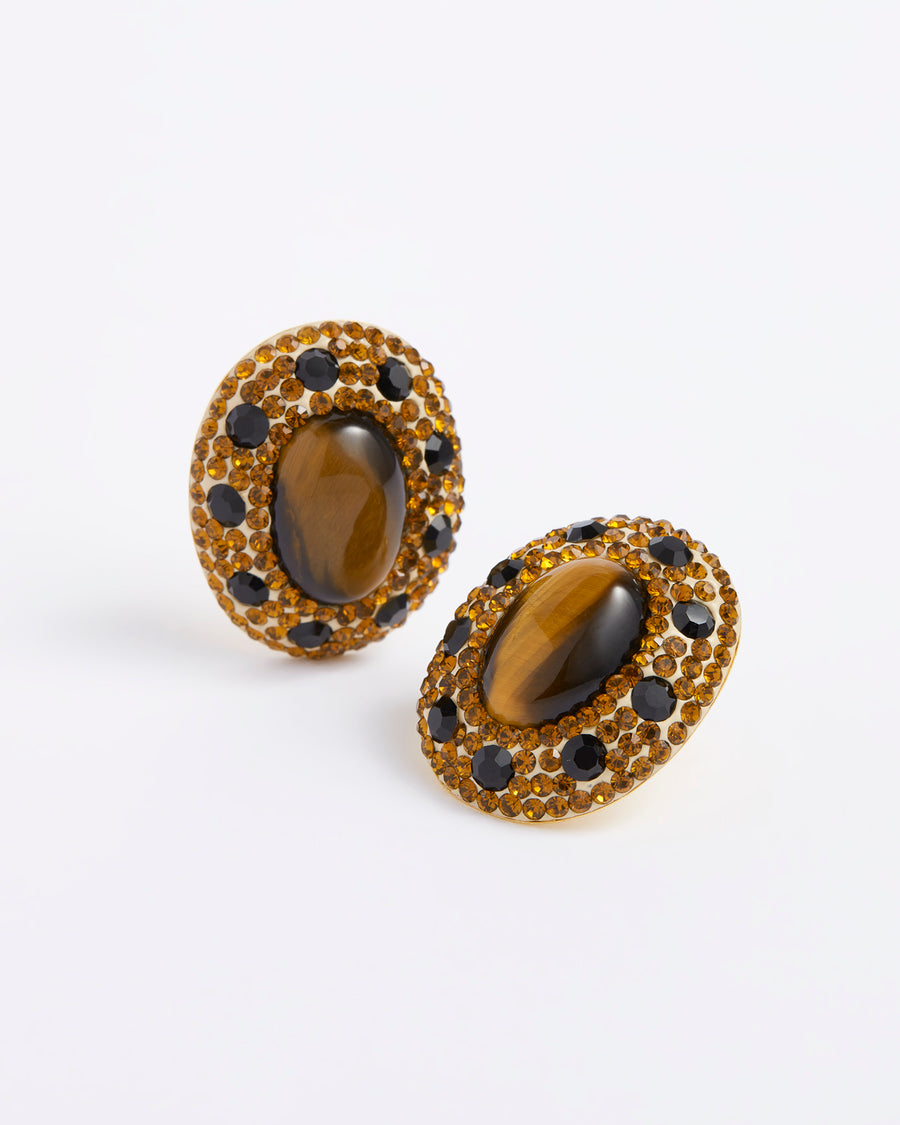 Product shot of shimmering tigers eye oval gemstone stud earrings.