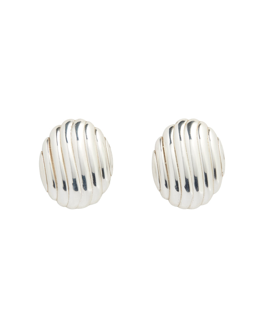 Product shot: Silver ribbed statement stud earrings on a white background