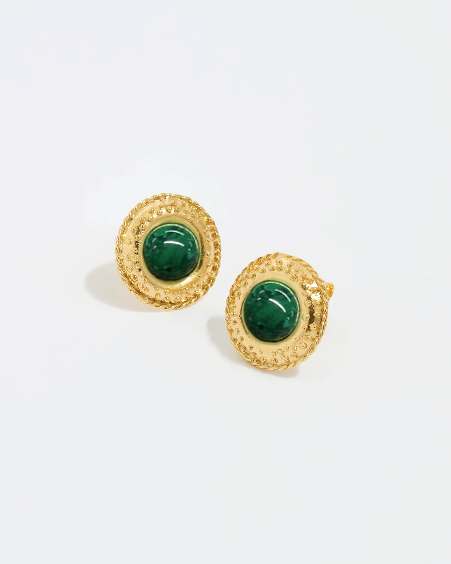 close up image shot of round gold textured stud earrings with a round malachite centre on a white back ground