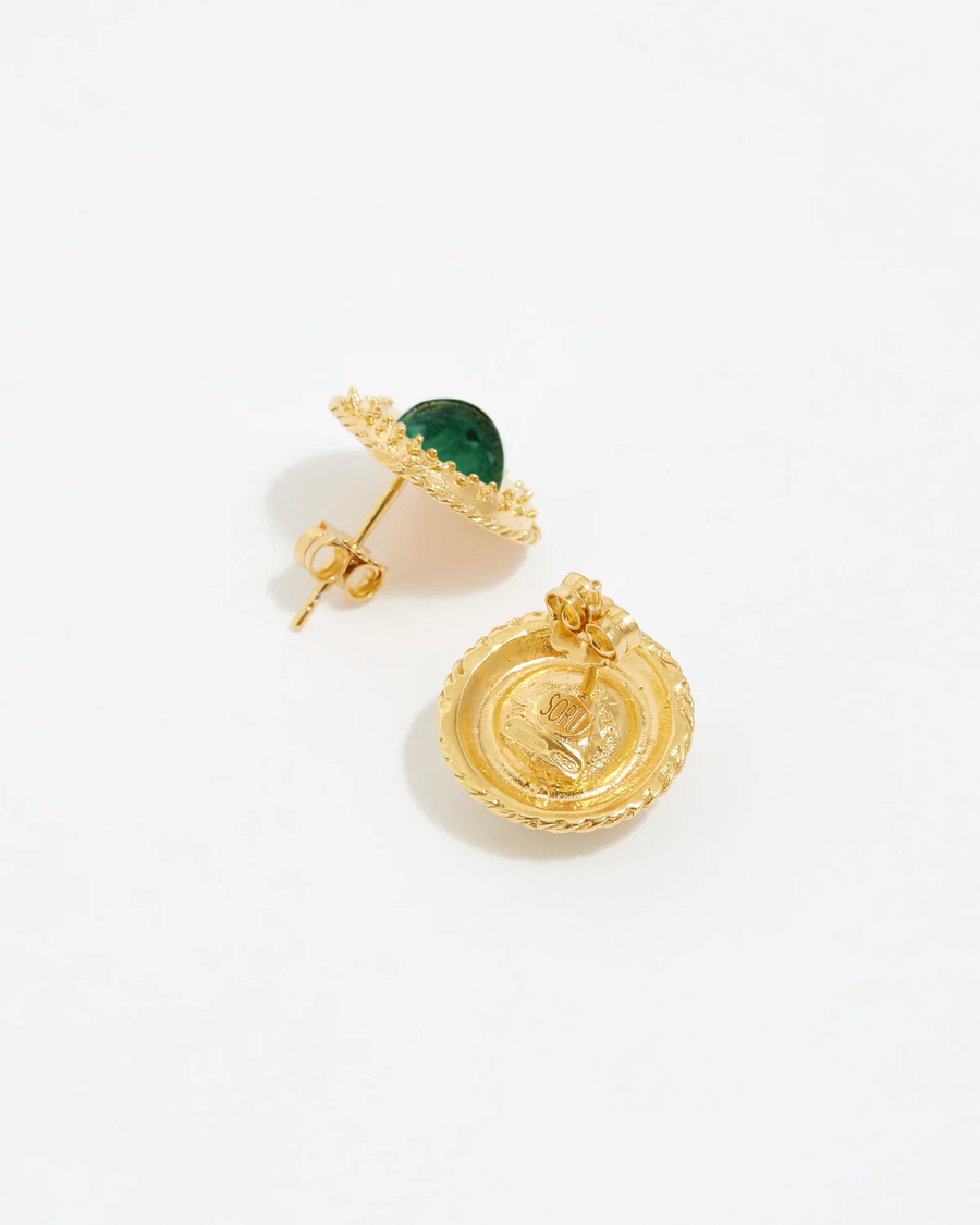 Side product shot of round gold textured stud earrings with a round malachite centre on a white back ground