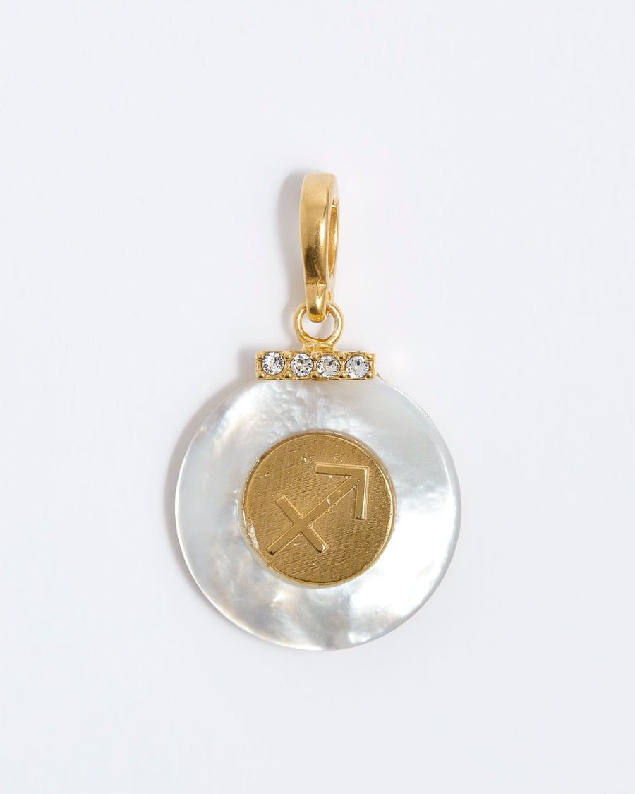 product shot - Sagittarius engraved gold coin with chunky pearl outer and diamond detailing placed on a white background