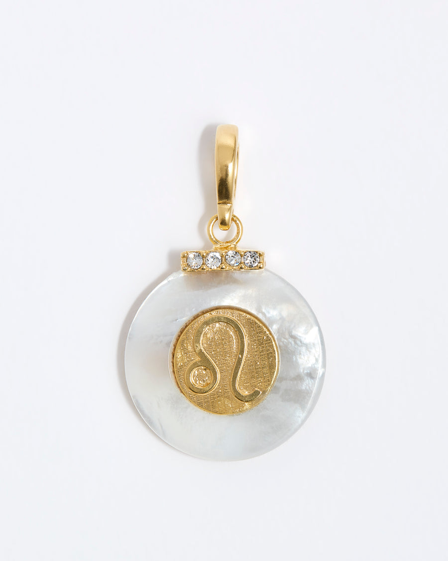 product shot - Leo engraved gold coin with chunky pearl outer and diamond detailing placed on a white background