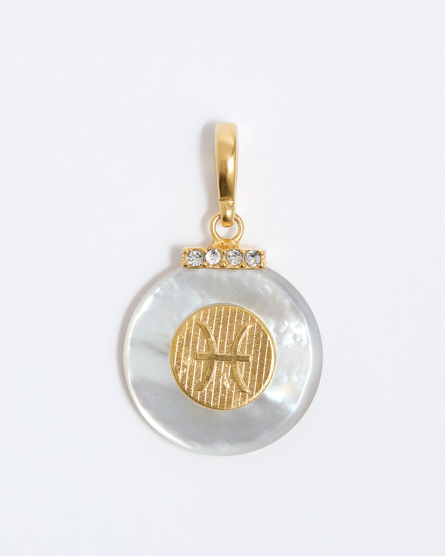 product shot - Pisces engraved gold coin with chunky pearl outer and diamond detailing placed on a white background